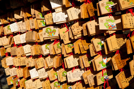 KYOTO, JAPAN - 27 NOV: Dragon wooden prayer tablets at Kiyomizu dera Kyoto on 27 November 2012 (The Dragon year). Pray for happieness good life healthy peace luck by write praying word in wooden.のeditorial素材