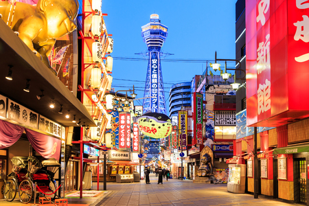 OSAKA,JAPAN- FEBRUARY 9:Night view of the neon advertisements Shinsekai on Feb 9, 2015 in Osaka, Japan.Is famous for its historic theatres,and restaurants, and its many neon and mechanised signs