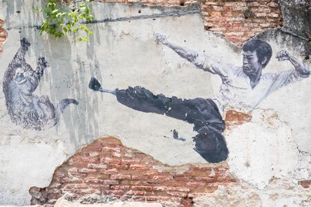 PENANG, MALAYSIA-Sep 6 : Street Mural tittle painted by Ernest Zacharevic in Penang on Sep 6, 2015. It was painted in conjunction with the 2012 George Town Festival.のeditorial素材