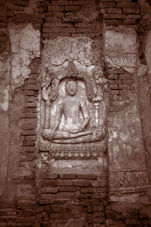 Buddha carvings on wall found at Wat Phra Ram, Ayutthaya, Thailand