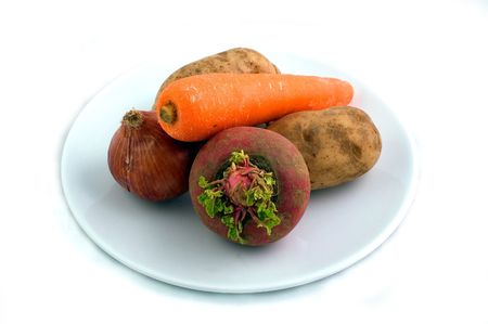Plate of Carrot, Onion, Potato and turnipの写真素材