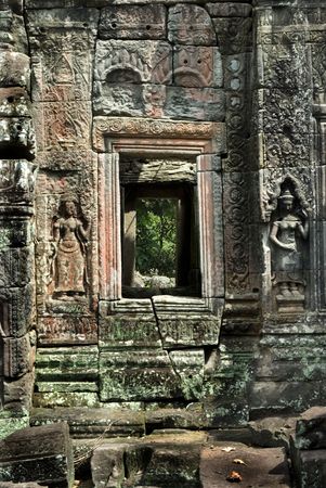 Apsara Carving and Door in Angkor Templeの写真素材