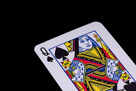 A poker card slanted view over black backgroundのeditorial素材