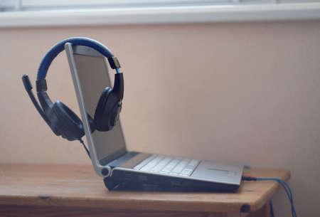 laptop with headphones on the table during quarantine