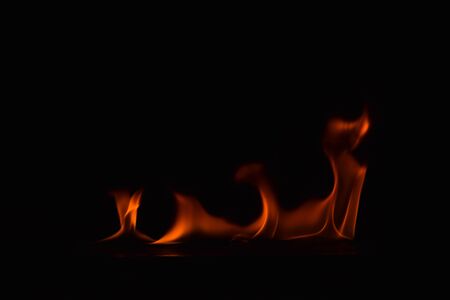 Fire flames on black backgroundの写真素材