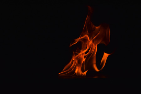 Fire flames on black backgroundの写真素材