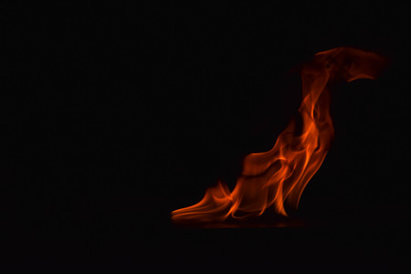 Fire flames on black backgroundの写真素材