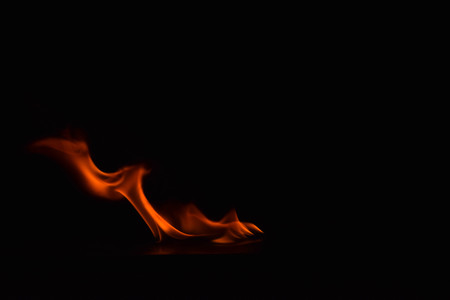 Fire flames on black backgroundの写真素材
