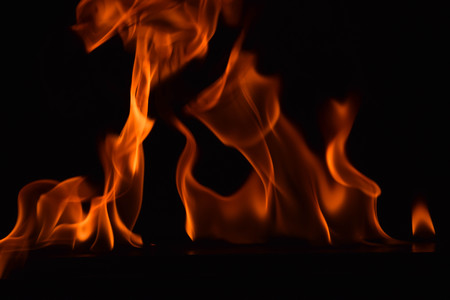 Fire flames on black backgroundの写真素材