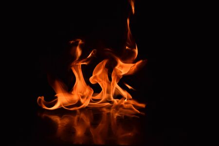 Abstract Fire flames isolated on black backgroundの写真素材