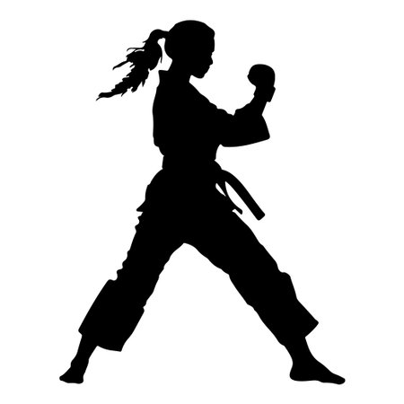 This striking silhouette showcases a female martial artist in a powerful fighting stance, capturing the essence of strength and focus in karate.のイラスト素材