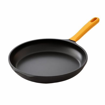 Explore this matte black frying pan featuring an ergonomic orange handle. Ideal for cooking, sautÃ©ing, and everyday meals.の写真素材