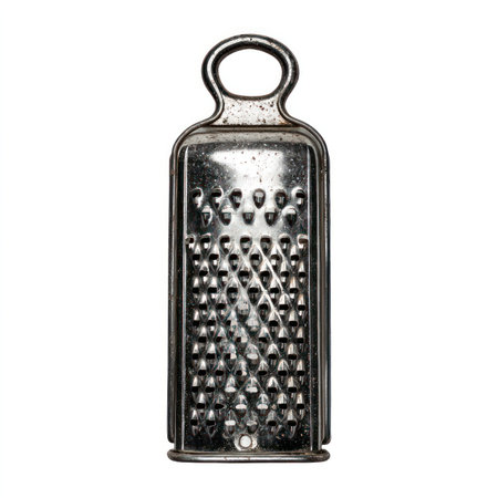 This image features a high-quality isolated cutout of a stainless steel grater perfect for culinary tasks. Ideal for food preparation and kitchen use.の写真素材