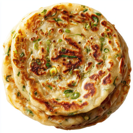 Delight in the sight of perfectly cooked scallion pancakes, showcasing their crispy texture and vibrant green onions. Ideal for food photography and recipes.の写真素材