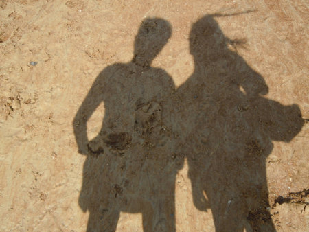 Shadow of two young peopleの写真素材