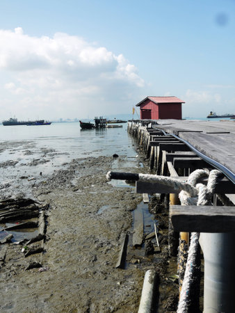 Old wooden pier heading out into the sea