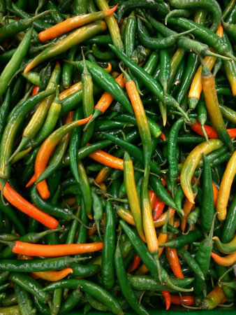 A group of fresh green chillies