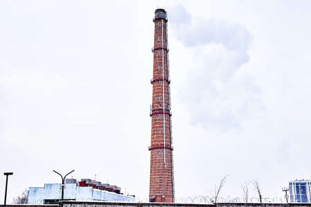 trucks covered with snow after a heavy snowfall. winter city landscape.の写真素材