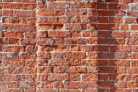The texture of an old brick wall with cracks. The aesthetics of destruction.