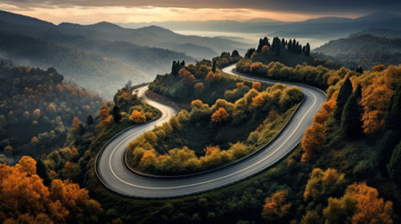 Beautiful autumn landscape with winding road in the mountains.の素材