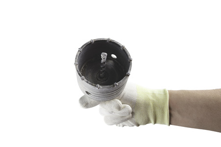 Steel alloy jackbit in the hand on the white background isolated.の写真素材