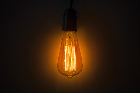 Old vintage edison bulb in the darkの写真素材