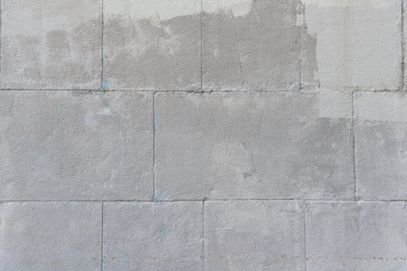 Old grey brick wall background textureの写真素材