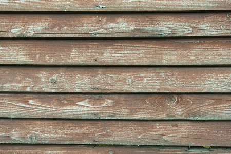 Rusty old red painted wood board wall textureの写真素材