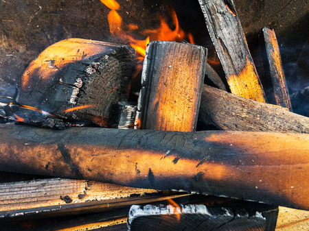 Burning wood in the grillの写真素材