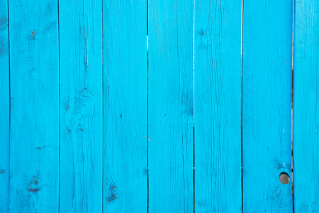 Old blue wooden plank fence background textureの写真素材