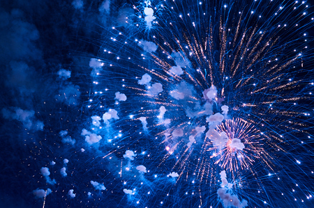 Inexpensive fireworks, over the city, red and blue . For any purpose
