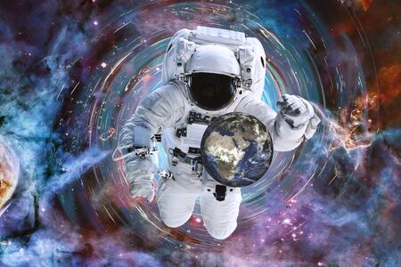 One Astronaut man save the Earth from crysis in black hole in outer space. Global disaster avoid concept,の写真素材