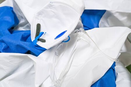 Medical protective suit at pandemic period. Respirator mask, hazmat suit and glassesの写真素材