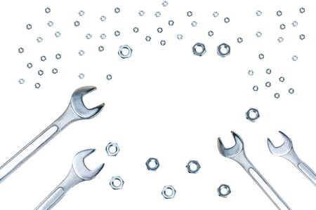 Spanners and screw nuts isolated on white background with copy space in centerの写真素材