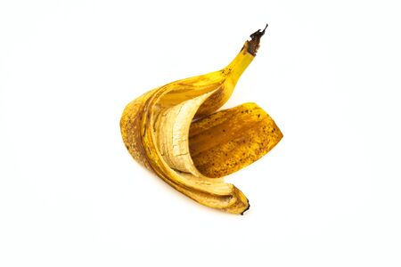 Ripe yellow banana peel isolated on white backgroundの写真素材