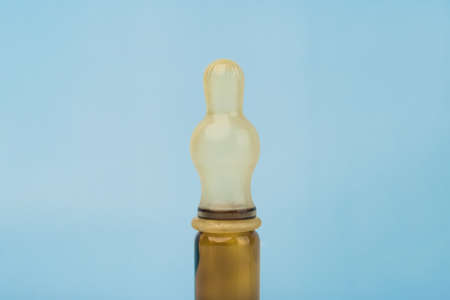 Baby pacifier on small bottle close up. Used for feeding baby and administering medications.の写真素材