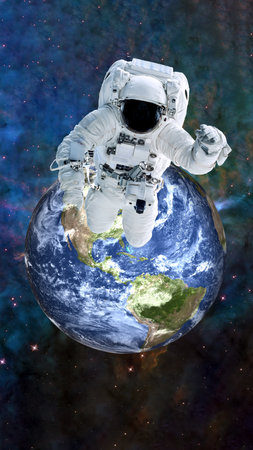 An astronaut in a white spacesuit floating in space during a spacewalk, with Earth visible below and a starry space background with nebulae. Elements of 3D rendered illustration.の写真素材