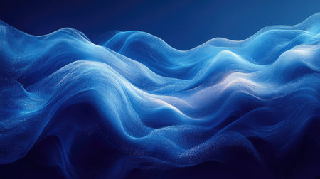 Abstract blue flowing waves forming digital particles backgroundの写真素材