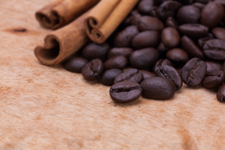 coffee bean and cinnamon on plank woodの写真素材