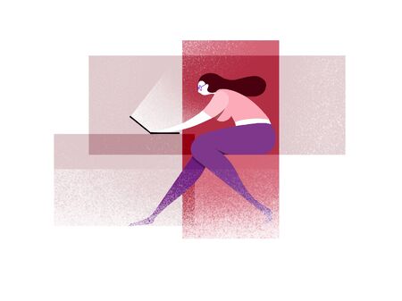 Young woman who is sitting, working on laptop. She is spending time on social media.の写真素材