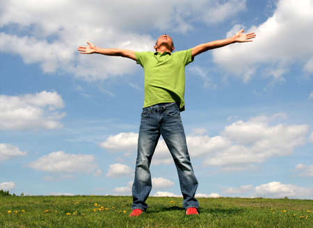 Man with his arms wide openの写真素材