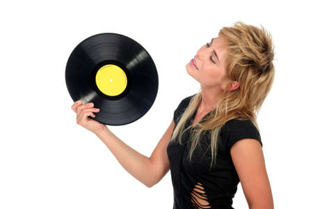 Woman holding music recordの写真素材