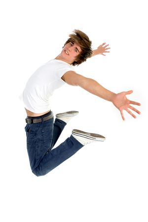 Studio shot of a young man jumpingの写真素材