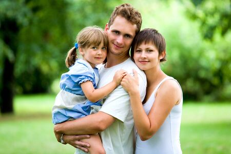 Young Family Bonding in Parkの写真素材