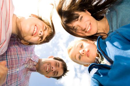 Happy family outdoorsの写真素材