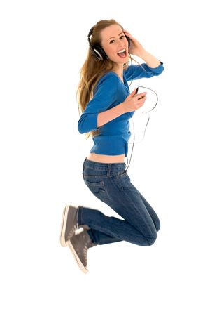 Woman Jumping with Headphonesの写真素材