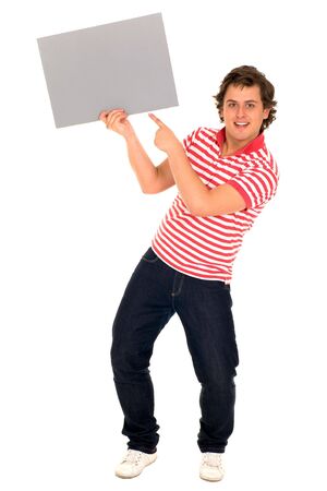 Young man holding blank posterの写真素材