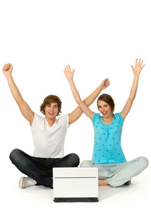 Couple with arms raisedの写真素材