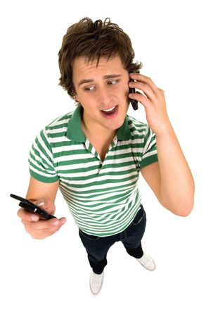 Man holding two mobile phonesの写真素材