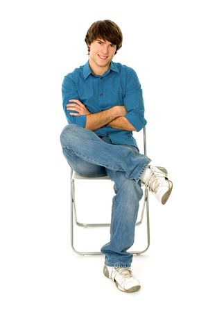 Young Man Sitting in Chair の写真素材